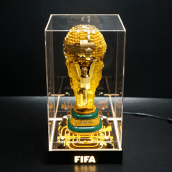 LEGO-crafted FIFA World Cup trophy in a clear display case, mounted on a black base.