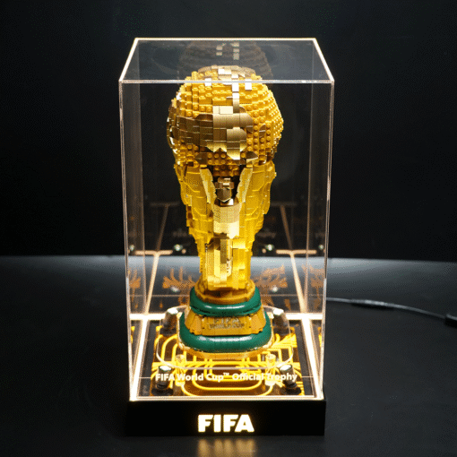 LEGO-crafted FIFA World Cup trophy in a clear display case, mounted on a black base.