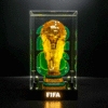 LEGO brick sculpture of the FIFA World Cup trophy inside a glass display case with an illuminated base reading FIFA