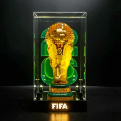 LEGO brick sculpture of the FIFA World Cup trophy inside a glass display case with an illuminated base reading FIFA