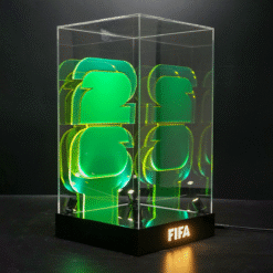 LED desk lamp in a clear acrylic case displaying stacked green 3D shapes, with the FIFA logo lit on the base.
