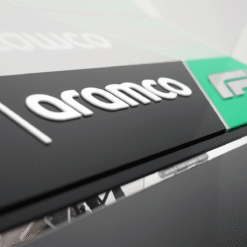 Close-up of a company logo reading 'aramo' on a dark panel with a green accent on the right.