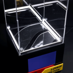 Clear acrylic display case with white LED edge lighting on a black base, nameplate reads LEWIS MILTON.